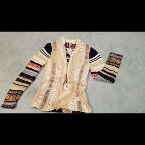 IVKO wrapover cardigan with embroidery.